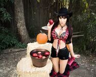 Angie bobbing for apples